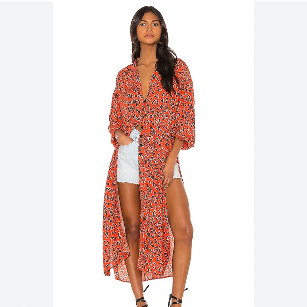Free People Orange Patterned Long Top! Adorable long shirt style size medium🦞